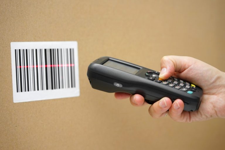 man using a barcode scanner