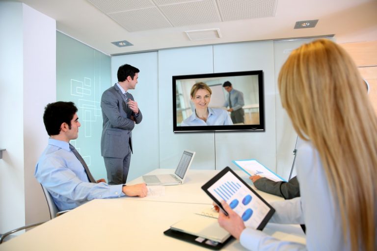 Employees looking at a video